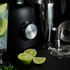 Promotional banner showing a blender with ice and two berry cocktails, with text: Bring the cocktail bar home.