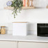 White square bread bin with bamboo lid on kitchen countertop