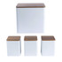 Set of four white storage canisters with wood lids for kitchen, including bread bin and jars