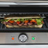 Grilled steak and vegetable baguette in electric sandwich press