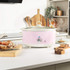 Pink Salter slow cooker filled with chilli, shown on kitchen counter