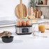 Salter electric egg cooker with tray and clear lid, shown separated