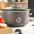 Grey Salter slow cooker with glass lid, shown open for UK kitchen appliances category.