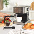 Stainless steel coffee machine control panel with three buttons, close-up