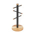 Black and wood mug tree with six pegs, freestanding on round base, product image.