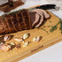 Rectangular bamboo chopping board with side handle groove, showing Salter branding.