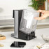 Black and stainless steel tea maker with removable water tank shown on a kitchen counter