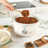 Cream Salter slow cooker filled with homemade chilli con carne, served with rice.