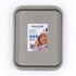 Medium non-stick baking tray in silver, with Salter branding and label on tray.