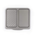 Grey non-stick oven tray with split grill and flat sections, top view