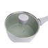 Green non-stick saucepan with glass lid, white handle, shown with broccoli and Brussels sprouts