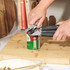 Salter can opener with soft grey handles in a kitchen drawer, next to timer and wooden spoons