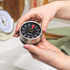Silver mechanical kitchen timer with Salter branding and black dial showing minutes.