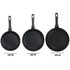 Set of black non-stick pots and pans with glass lids, suitable for induction hobs.