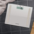 Digital bathroom scale with illustration showing foot placement for UK sizes 6 and 9.