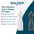 White Salter pepper mill on shelf beside stacked cups and cookbooks