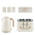 Cream kitchen set with Salter kettle, 4-slice toaster, tea, coffee, sugar jars, and bread bin