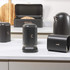Black 4-slice toaster with copper controls, front view