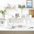Set of three white kitchen storage tins labelled S, C, T for sugar, coffee, tea.