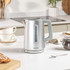 Silver electric kettle with water gauge, shown on kitchen counter