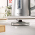 Grey Salter electric kettle on base, shown in kitchen setting