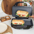 Salter stainless steel sandwich maker with black casing, closed, shown from above