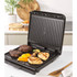 Black electric grill with open lid showing non-stick plates