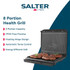 Black panini press with two toasted sandwiches shown inside
