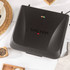 Black Salter sandwich maker closed, showing lid with indicator lights, top-down view
