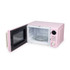 Pink microwave with open door, glass turntable and manual dials visible