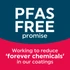 Black air fryer with salmon and vegetables showing separate racks for crisping and sides