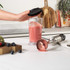 Black and stainless steel hand blender handle with turbo button, UK plug not shown
