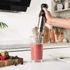 Black and stainless steel hand blender handle with turbo button, UK plug not shown