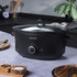 Black Salter 4-slice toaster on a kitchen counter with bread toasting