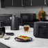 Salter black 4-slice toaster with bread toasting, shown on kitchen counter