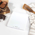 White digital kitchen scale with LCD display, showing 176 grams