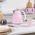 Pink four-slice toaster with chrome details on kitchen worktop