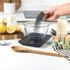 Black digital kitchen scale with touch buttons, angled view