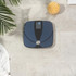 Black digital bathroom scale with LED display, shown from top angle