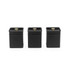 Set of three black metal storage canisters with gold knobs, front view.
