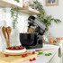Salter Alchemy stand mixer box showing black and gold mixer with bowl attachments, 5L capacity.