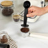 Cream Salter espresso machine close up showing control dial and portafilter.