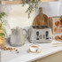 Taupe ribbed electric kettle with chrome handle, shown upright on white background.