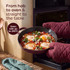 Purple non-stick frying pan cooking pancakes on induction hob, kitchen setting