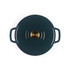 Dark green cast iron casserole dish with gold knob on wood counter