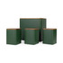 Green bread bin with wooden lid, holding seeded rolls