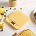 Yellow digital kitchen scale on marble countertop, styled with lemons and blueberries