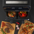 Salter dual air fryer with open drawers, showing cooked chicken, vegetables, steak and chips