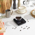 Boxed Salter coffee scale with black digital display and coffee beans shown in bowl