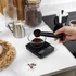 Black digital kitchen scale with LED display, shown from above